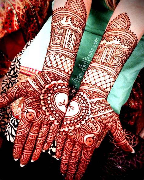 initial mehndi design