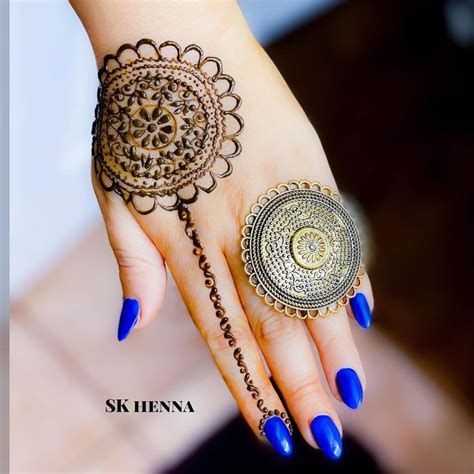 small mehndi design tattoo