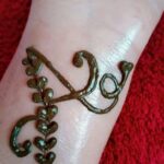 a letter mehndi design