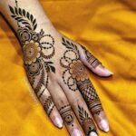 unique back hand mehndi design
