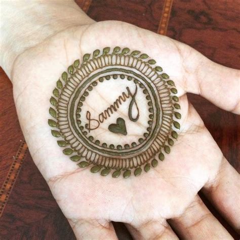 mehndi design with hidden name